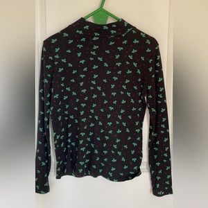 Size small black long sleeve with mistletoe and holly design